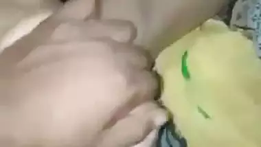 Guy squeezes a 19-year-old nude girl’s juicy boobs